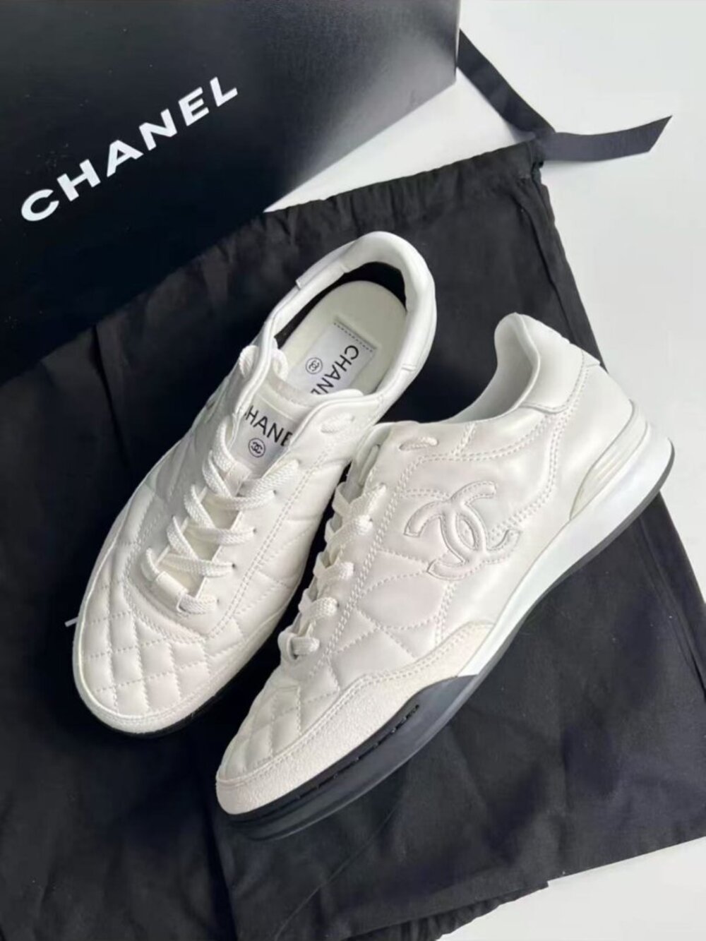 Chanel White Quilted Lace-Up Sneakers